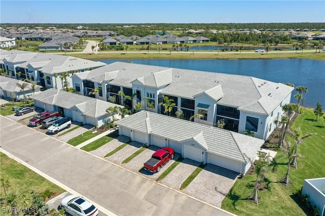 bird's eye view featuring a residential view and a water view