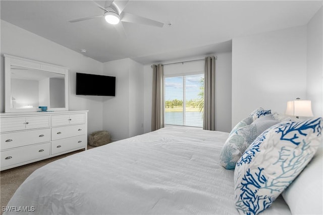 bedroom with carpet, access to exterior, and a ceiling fan