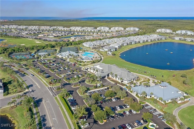 aerial view featuring a residential view and a water view