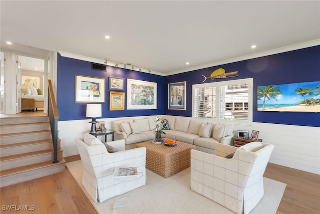 living room featuring recessed lighting, visible vents, stairway, and wood finished floors