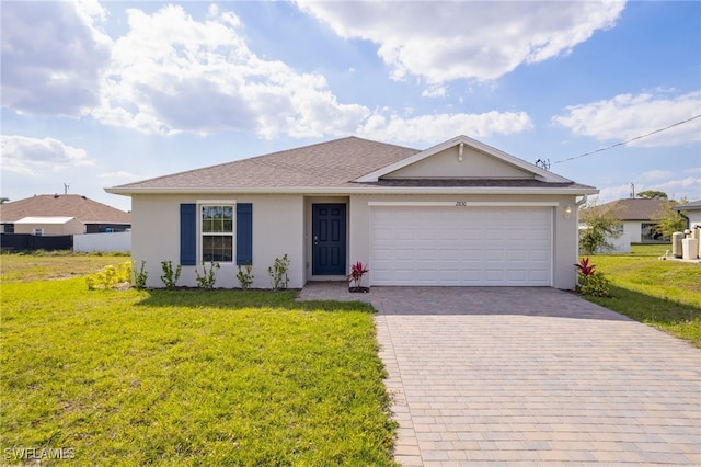 ranch-style house featuring a garage, stucco siding, decorative driveway, and a front yard