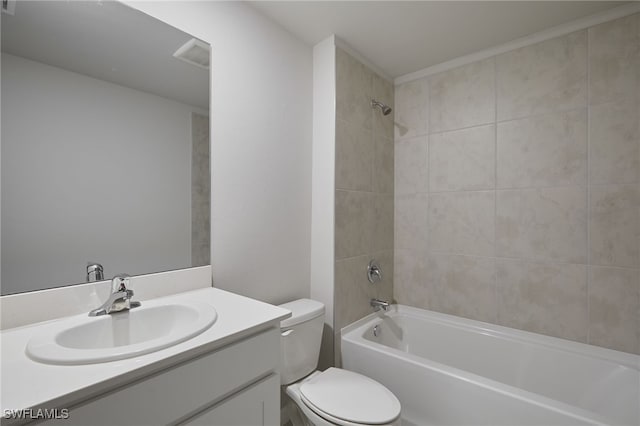 full bathroom featuring toilet, washtub / shower combination, visible vents, and vanity