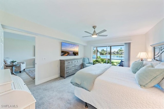 bedroom featuring ceiling fan, baseboards, and carpet flooring
