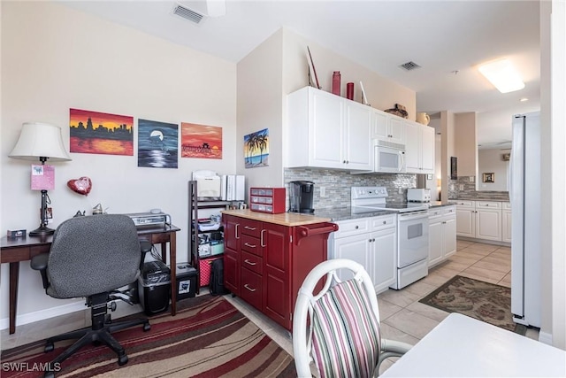 kitchen with visible vents, backsplash, white appliances, and white cabinetry