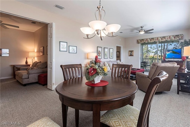 dining room with a ceiling fan, visible vents, carpet floors, and baseboards