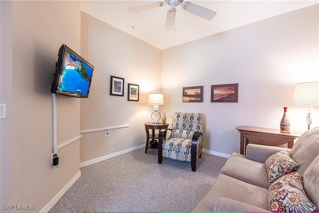 carpeted living room with baseboards and ceiling fan