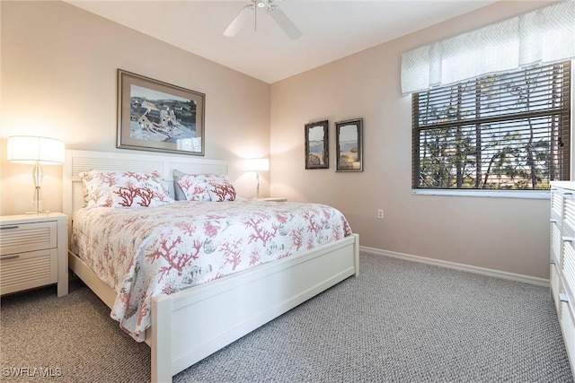 carpeted bedroom with baseboards and ceiling fan