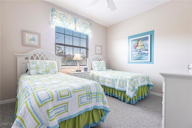 carpeted bedroom with baseboards and ceiling fan