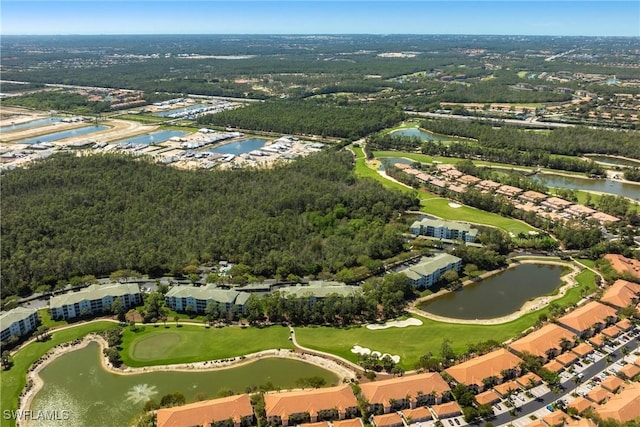 bird's eye view featuring a water view and golf course view