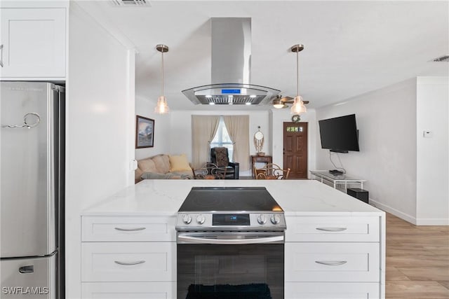 kitchen featuring open floor plan, stainless steel appliances, white cabinets, island range hood, and light stone countertops