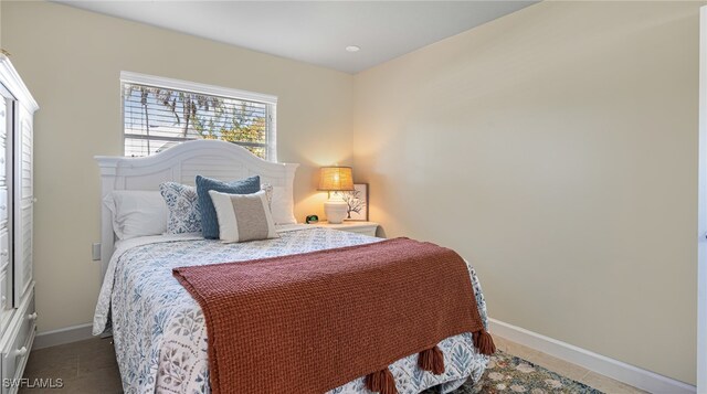 bedroom with baseboards