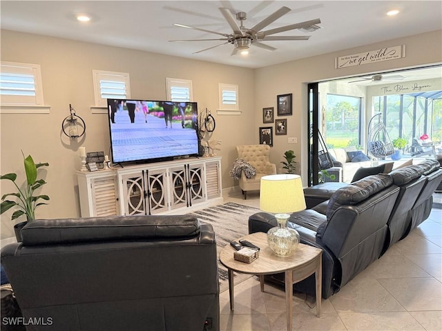 living room with light tile patterned floors, ceiling fan, plenty of natural light, and recessed lighting