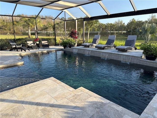 outdoor pool featuring a lanai and a patio