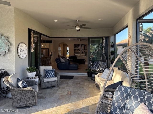 view of patio / terrace featuring a ceiling fan