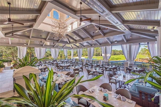 view of patio featuring ceiling fan and outdoor dining space