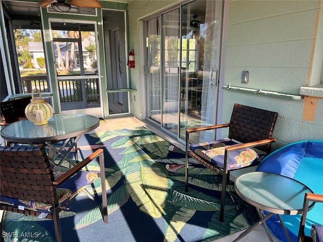 exterior space featuring a ceiling fan and outdoor dining space