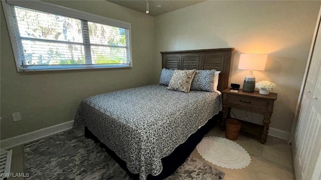 bedroom with baseboards