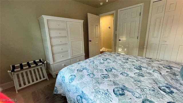 bedroom featuring baseboards