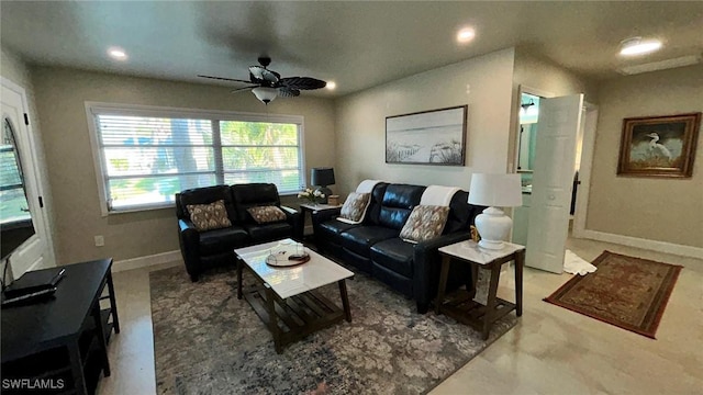 living area with ceiling fan, recessed lighting, and baseboards