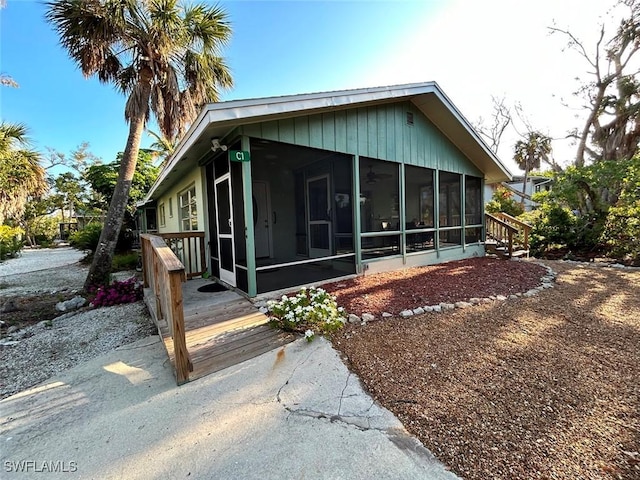 view of front facade featuring a sunroom