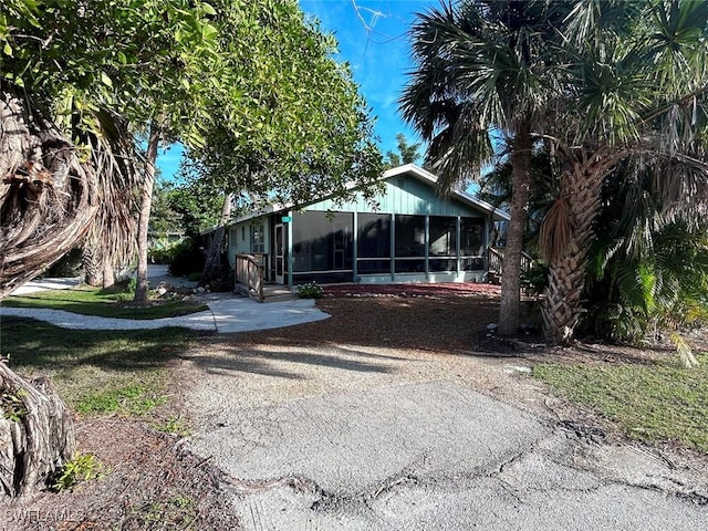 exterior space with a sunroom