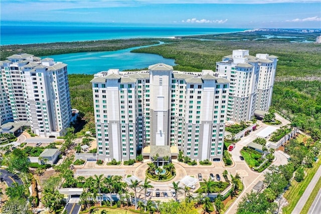 drone / aerial view with a view of city and a water view