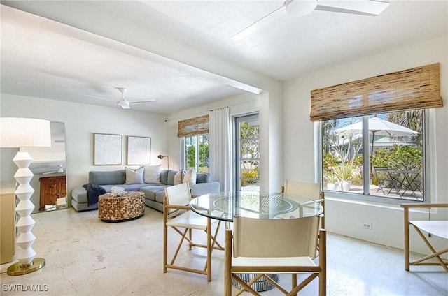 dining room featuring ceiling fan