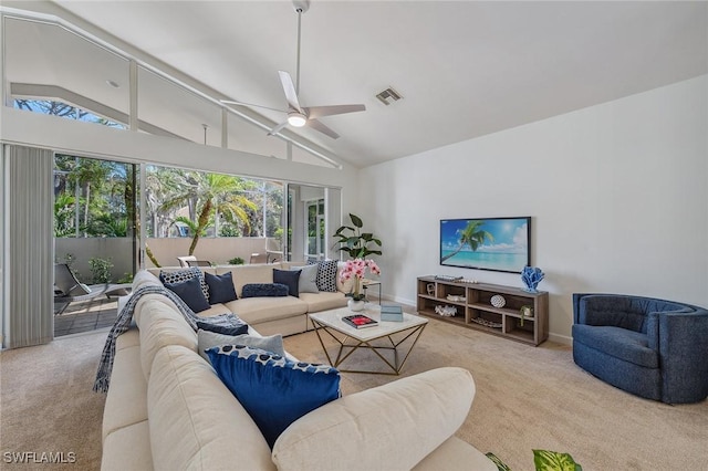 living room featuring a ceiling fan, carpet, visible vents, and high vaulted ceiling