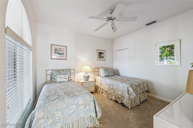 27145 Lost Lake Ln, Bonita Springs, FL 34134 - bedroom with visible vents, a ceiling fan, a closet, carpet flooring, and baseboards
