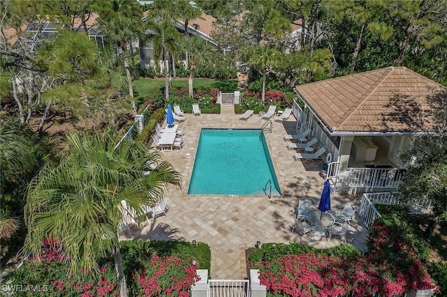 27145 Lost Lake Ln, Bonita Springs, FL 34134 - community pool featuring a patio