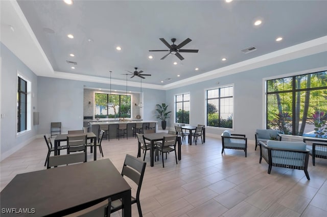 dining area featuring visible vents, baseboards, a ceiling fan, a tray ceiling, and recessed lighting