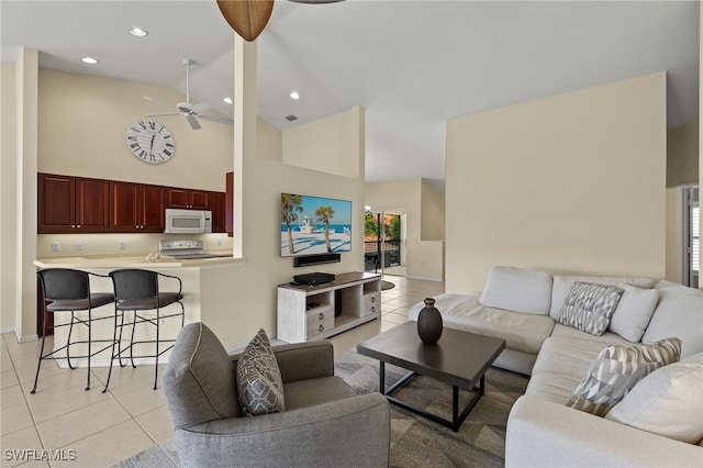 living room featuring light tile patterned floors, a healthy amount of sunlight, recessed lighting, and ceiling fan