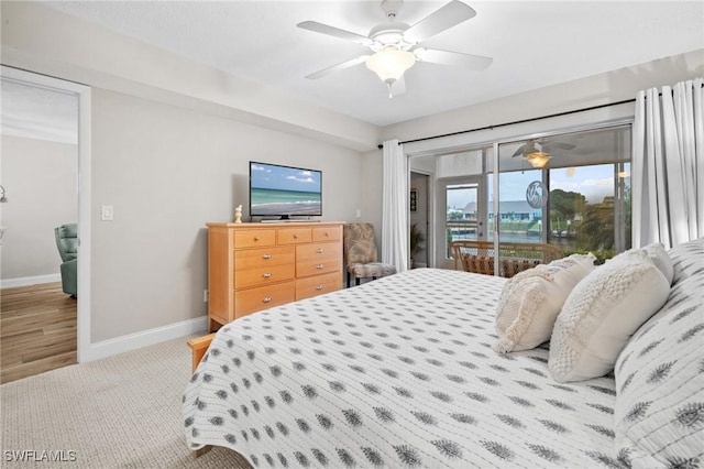 carpeted bedroom with access to exterior, baseboards, and a ceiling fan