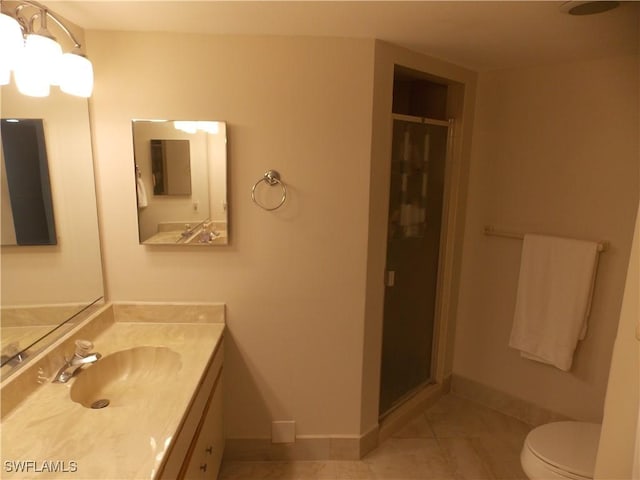 full bath featuring toilet, a stall shower, baseboards, and vanity