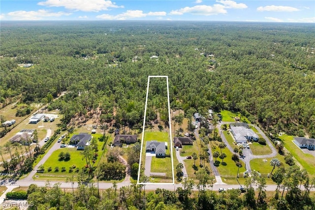 aerial view featuring a forest view