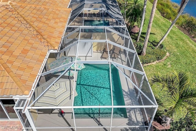 exterior space featuring a patio area and a lanai