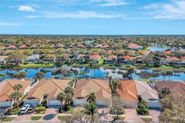 aerial view with a water view and a residential view