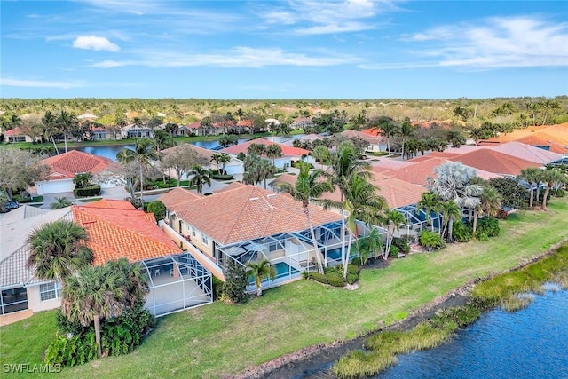 aerial view featuring a water view and a residential view