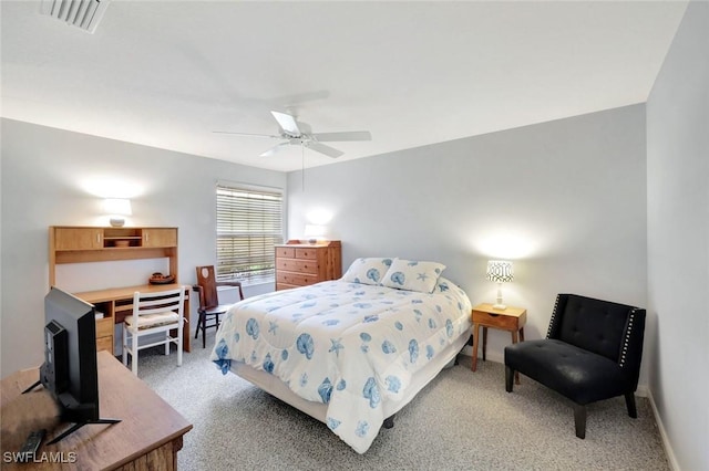 bedroom featuring light carpet, baseboards, visible vents, and a ceiling fan