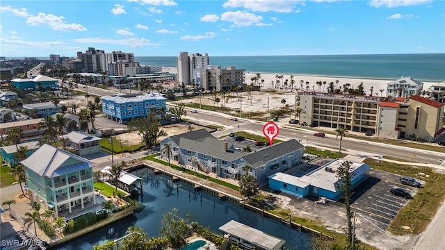 aerial view with a water view and a city view