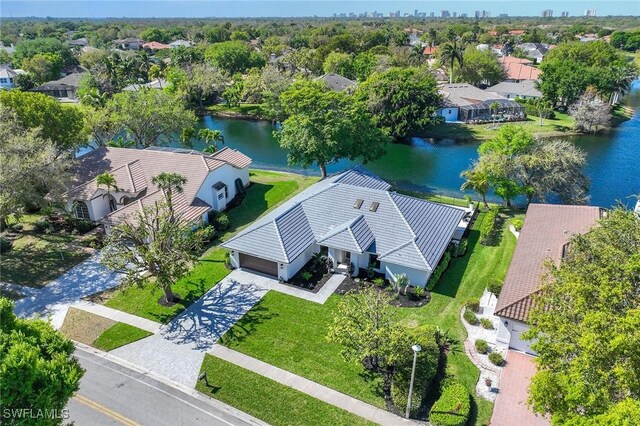 bird's eye view with a residential view and a water view