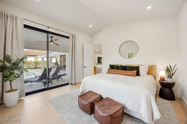 bedroom featuring access to outside, lofted ceiling, recessed lighting, and wood finished floors