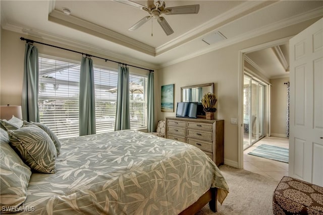 bedroom with light carpet, light tile patterned floors, baseboards, a raised ceiling, and crown molding