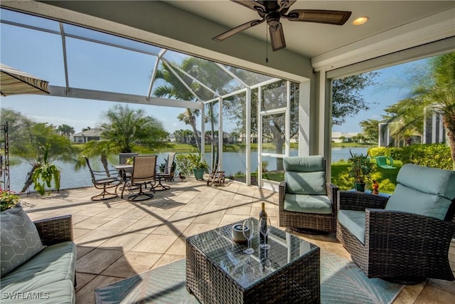 exterior space featuring a ceiling fan, glass enclosure, a water view, outdoor dining area, and outdoor lounge area