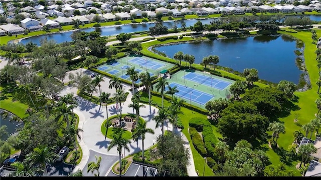 bird's eye view featuring a water view and a residential view