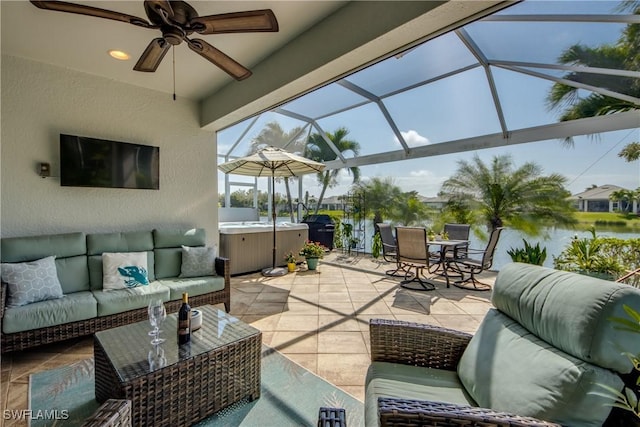 view of patio featuring outdoor lounge area, a hot tub, a ceiling fan, outdoor dining space, and glass enclosure