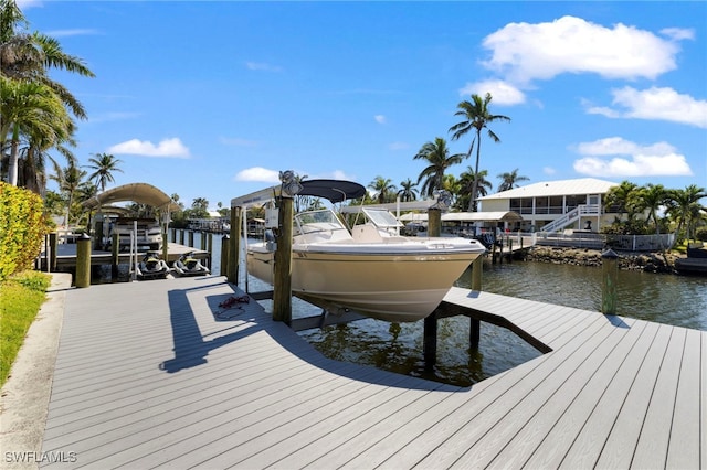 dock area featuring a water view and boat lift