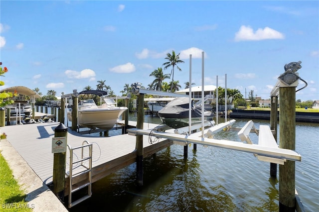 view of dock with a water view and boat lift