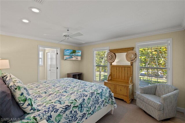 bedroom featuring recessed lighting, light carpet, crown molding, and ceiling fan