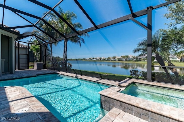 view of swimming pool with a water view, a patio area, a pool with connected hot tub, and a lanai